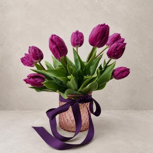 Five Acre Florets Tulip Vase — purple tulips in a pink faceted glass vase with a deep purple ribbon
